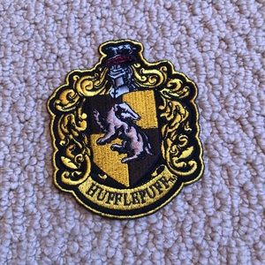Wizarding World of Harry Potter Hufflepuff Badge